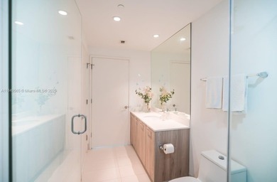 Beautiful 2 bedroom, 2 bath corner apartment with a den that can