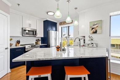 Beautifully updated top floor oceanfront villa with a huge