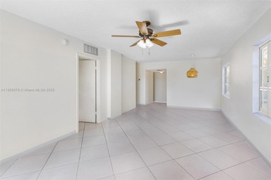 Bright and spacious corner unit with 1 bed, 1.5 baths, and a