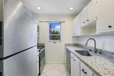 Bright and spacious corner unit with 1 bed, 1.5 baths, and a