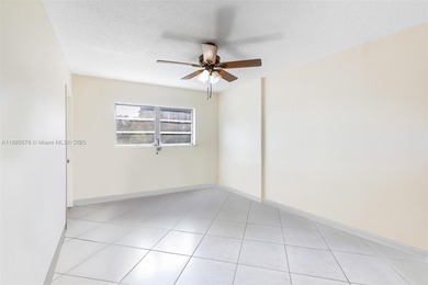 Bright and spacious corner unit with 1 bed, 1.5 baths, and a