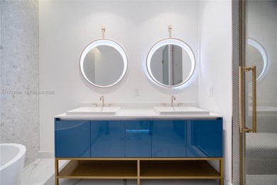 Unit 2,487 sqft (Liv area) 2,648 sqft (ADJ). Mr. C Bayshore