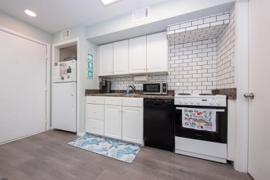 Welcome to Oceanside Condominium unit 35. Beautifully updated