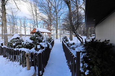 Beautiful 20-acre property bordering on US-23, with many mature