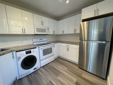 A FULLY REMODELED UNIT, IT IS BRIGHT AND HAS GREAT VIEWS