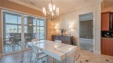 Experience luxury lakefront living in this spacious 3-bedroom