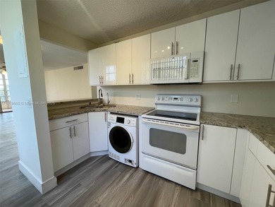 A FULLY REMODELED UNIT, IT IS BRIGHT AND HAS GREAT VIEWS