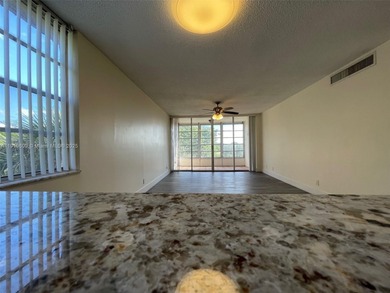 A FULLY REMODELED UNIT, IT IS BRIGHT AND HAS GREAT VIEWS