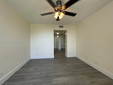 A FULLY REMODELED UNIT, IT IS BRIGHT AND HAS GREAT VIEWS