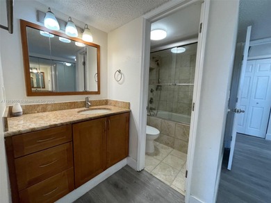 A FULLY REMODELED UNIT, IT IS BRIGHT AND HAS GREAT VIEWS