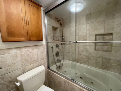 A FULLY REMODELED UNIT, IT IS BRIGHT AND HAS GREAT VIEWS