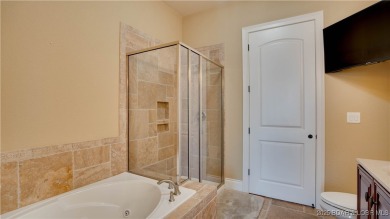 Experience luxury lakefront living in this spacious 3-bedroom