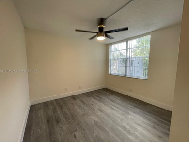 A FULLY REMODELED UNIT, IT IS BRIGHT AND HAS GREAT VIEWS