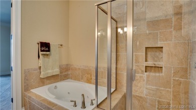 Experience luxury lakefront living in this spacious 3-bedroom