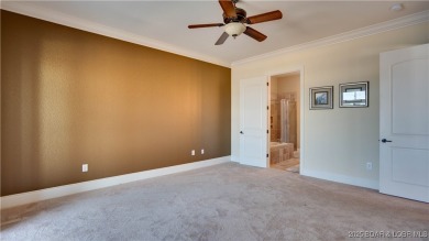 Experience luxury lakefront living in this spacious 3-bedroom