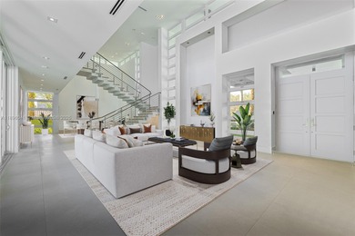 Nestled on nearly an acre in Northeast Pinecrest, this