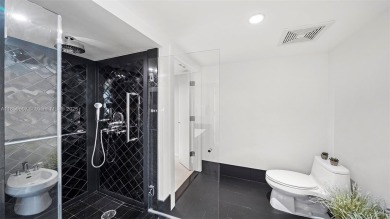 Perched on the 39th floor of The Setai, this stunning 3 bed / 3