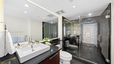 Perched on the 39th floor of The Setai, this stunning 3 bed / 3