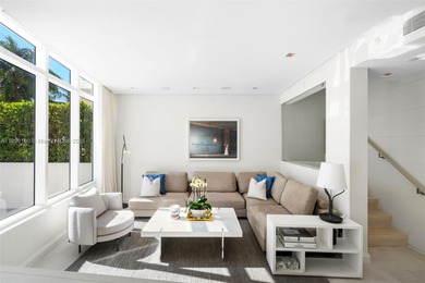 Experience the pinnacle of oceanfront living, a turnkey 4-bdrm