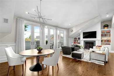 Penthouse chic welcomes you in this elegant, sparkling top floor