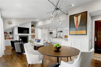 Penthouse chic welcomes you in this elegant, sparkling top floor