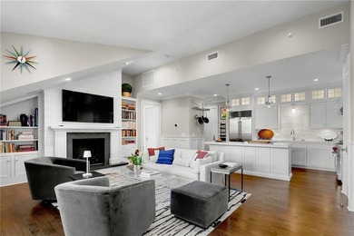 Penthouse chic welcomes you in this elegant, sparkling top floor