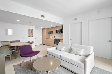 By combining the local atmosphere of a homestay with the service