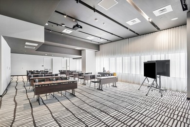 By combining the local atmosphere of a homestay with the service