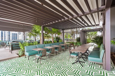 By combining the local atmosphere of a homestay with the service