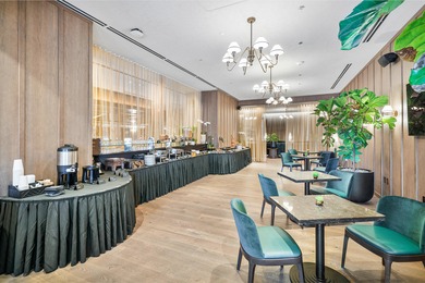 By combining the local atmosphere of a homestay with the service