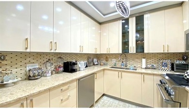 Live in a luxurious oceanfront gated community with resort-style