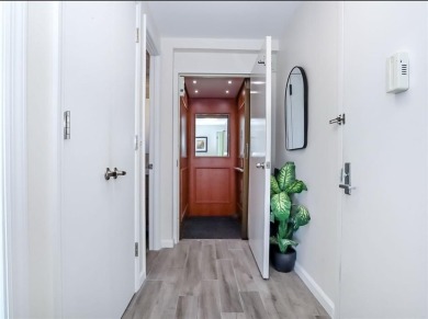 Welcome to this stunning duplex 3-bedroom, 3-bath penthouse with