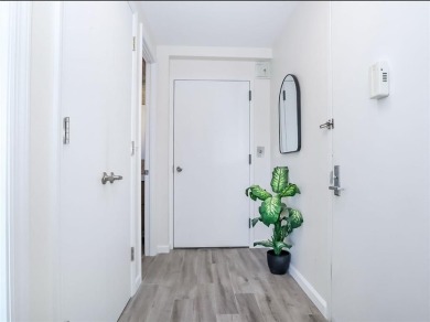 Welcome to this stunning duplex 3-bedroom, 3-bath penthouse with