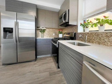 Welcome to this stunning duplex 3-bedroom, 3-bath penthouse with