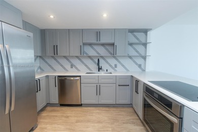 FOR SALE! Stunning 1-bedroom, 1.5-bath condo in the highly