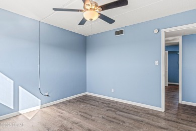 Stunning three bedroom remodeled end unit with panoramic water