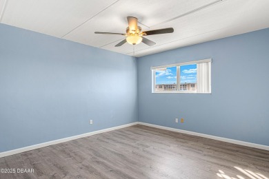 Stunning three bedroom remodeled end unit with panoramic water