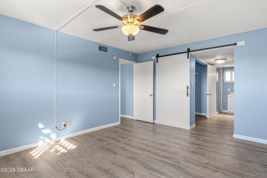 Stunning three bedroom remodeled end unit with panoramic water