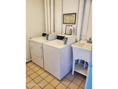 Stunning three bedroom remodeled end unit with panoramic water