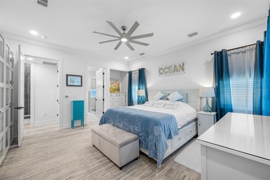 Welcome to this exceptional elevated Key West style 4-bedroom