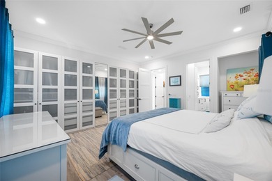 Welcome to this exceptional elevated Key West style 4-bedroom