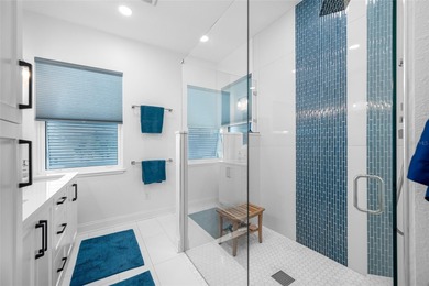 Welcome to this exceptional elevated Key West style 4-bedroom