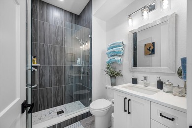 Welcome to this exceptional elevated Key West style 4-bedroom