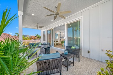 Welcome to this exceptional elevated Key West style 4-bedroom