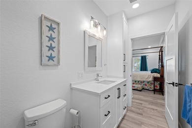 Welcome to this exceptional elevated Key West style 4-bedroom