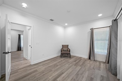 Welcome to this exceptional elevated Key West style 4-bedroom