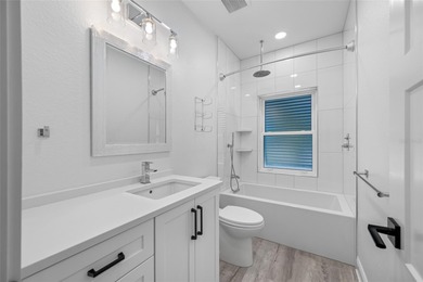 Welcome to this exceptional elevated Key West style 4-bedroom