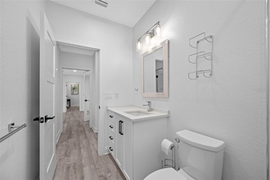 Welcome to this exceptional elevated Key West style 4-bedroom