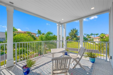 Welcome to this exceptional elevated Key West style 4-bedroom