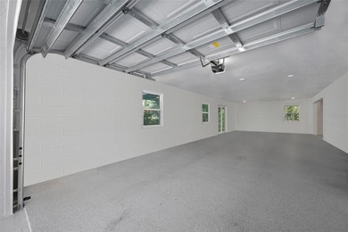 Welcome to this exceptional elevated Key West style 4-bedroom